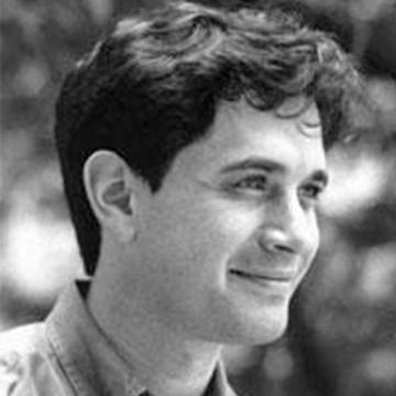 Michael Mitzenmacher. Black and White Headshot of Michael, who is looking right. He has short dark hair and is smiling.